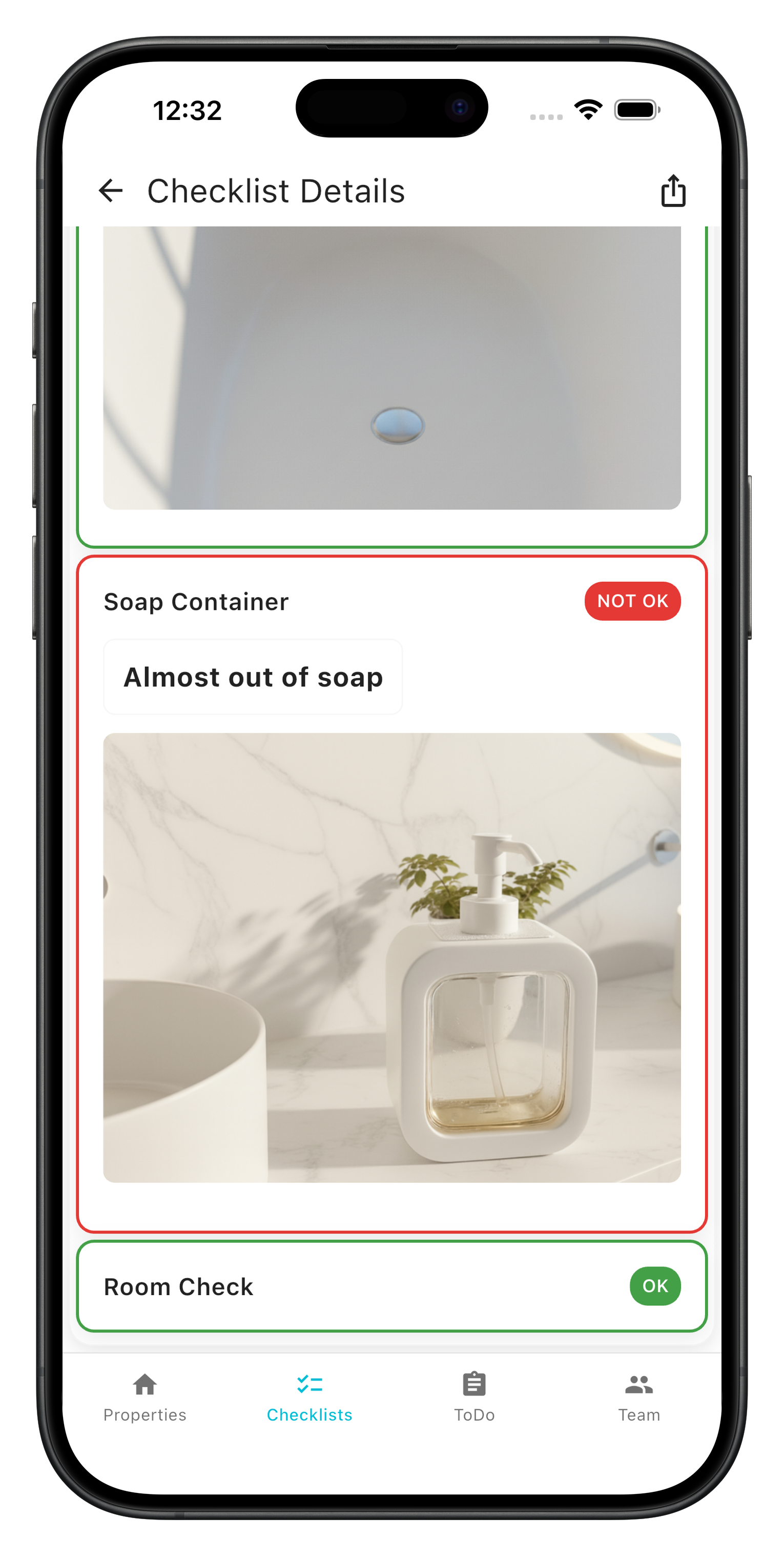 Host viewing flagged issue with photo evidence before guest arrival